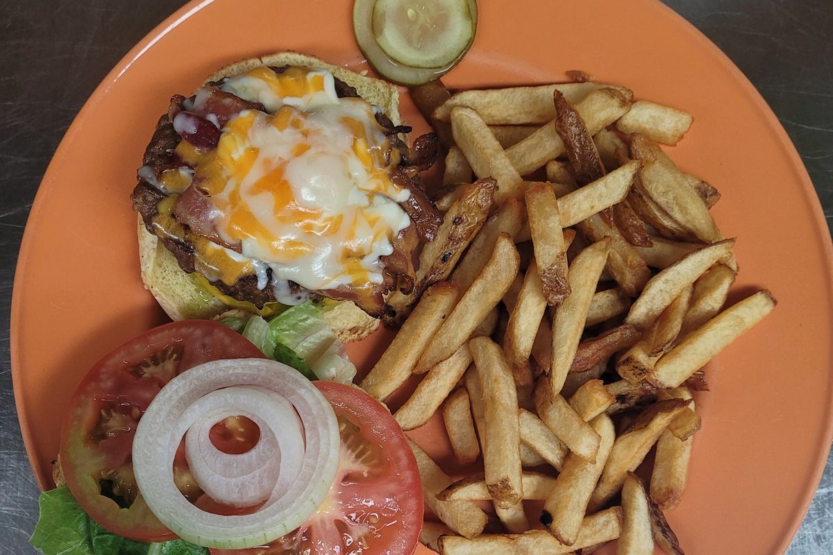 Triple cheese and bacon burger with fries