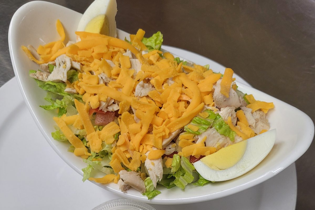 Julian salad with cheddar, egg and chicken